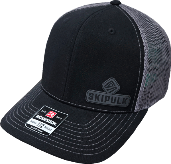 SkiPulk Snapback hat with logo patch