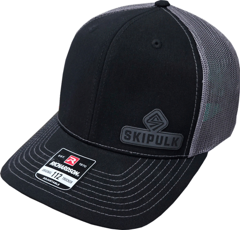 SkiPulk Snapback hat with logo patch